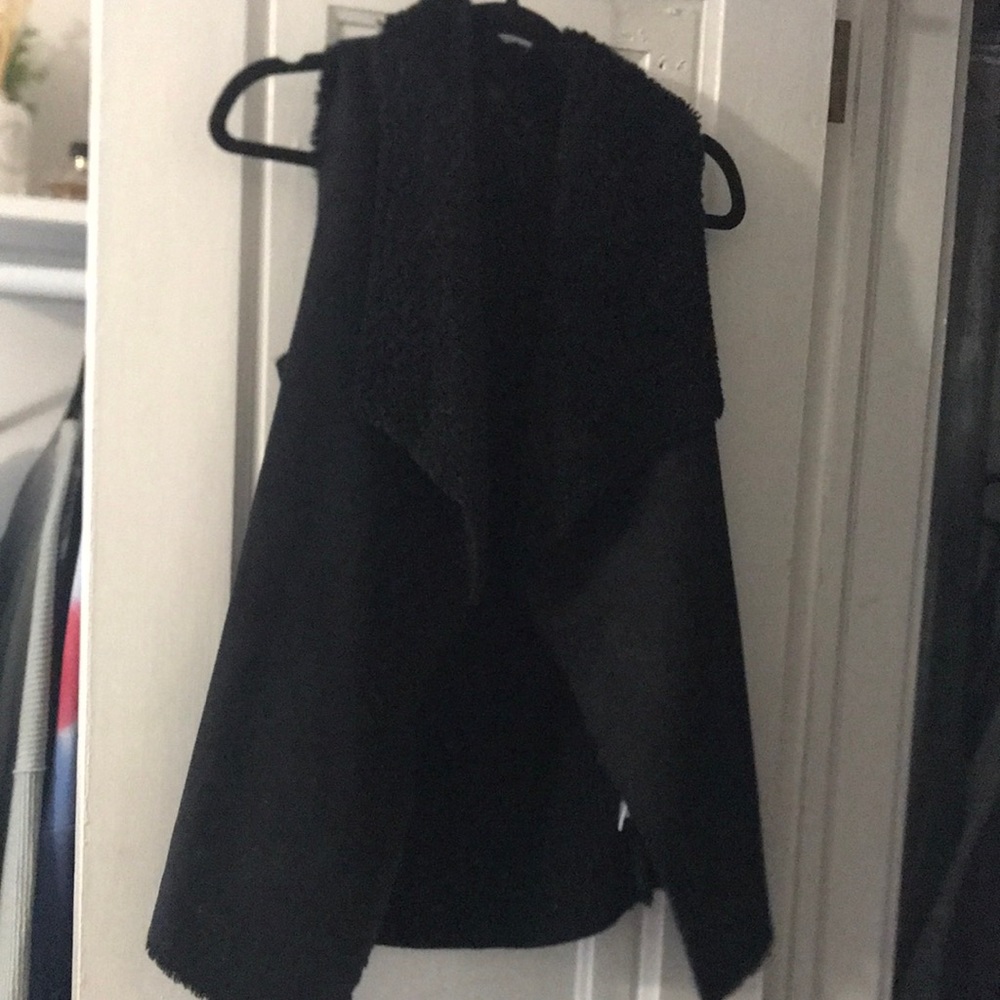 Black vest, size small